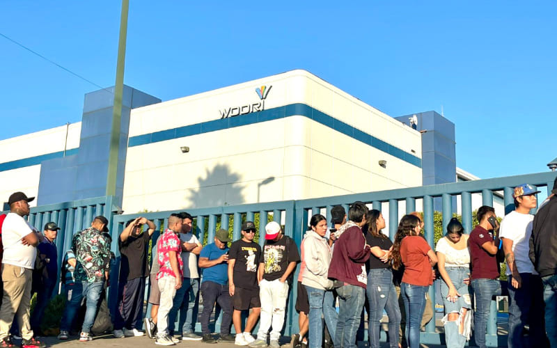 Trabajadores de Woori Printing se manifiestan por pagos retenidos